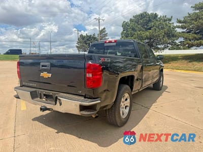 Czwarte zdjęcie samochodu z boku: 2015 CHEVROLET SILVERADO K1500 LT VIN:3GCUKREC6FG139136 - miniatura