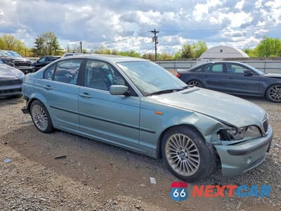 Czwarte zdjęcie samochodu z boku: 2002 BMW 330 I VIN:WBAEV53462KM20708 - miniatura