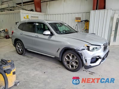 Czwarte zdjęcie samochodu z boku: 2021 BMW X3 XDRIVE30I VIN:5UXTY5C06M9H60936 - miniatura