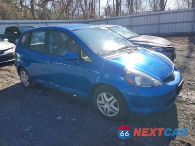 Czwarte zdjęcie samochodu z boku: 2007 HONDA FIT VIN:JHMGD37457S031822 - miniatura