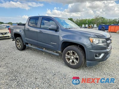 Czwarte zdjęcie samochodu z boku: 2016 CHEVROLET COLORADO Z71 VIN:1GCGSDE38G1240775 - miniatura