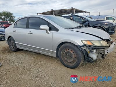 Czwarte zdjęcie samochodu z boku: 2010 HONDA CIVIC LX VIN:19XFA1F57AE067543 - miniatura