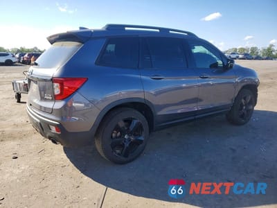 Trzecie zdjęcie samochodu z tyłu: 2021 HONDA PASSPORT ELITE VIN:5FNYF8H03MB023901 - miniatura