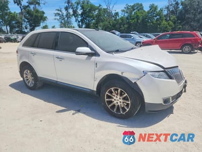 Czwarte zdjęcie samochodu z boku: 2014 LINCOLN MKX VIN:2LMDJ6JK1EBL00377 - miniatura