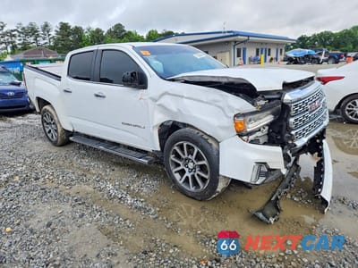 Czwarte zdjęcie samochodu z boku: 2021 GMC CANYON DENALI VIN:1GTG6EEN4M1188620 - miniatura