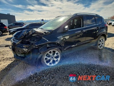 2015 FORD ESCAPE TITANIUM 1FMCU0J97FUB25248 - główne zdjęcie licytacji z USA - miniatura