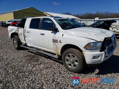 Czwarte zdjęcie samochodu z boku: 2014 RAM 3500 LONGHORN VIN:3C63R3NL0EG326284 - miniatura