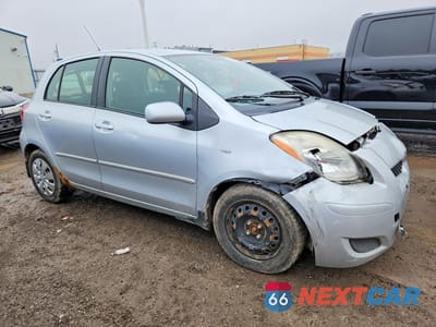 Czwarte zdjęcie samochodu z boku: 2010 TOYOTA YARIS BASE VIN:JTDKT4K31A5314811 - miniatura