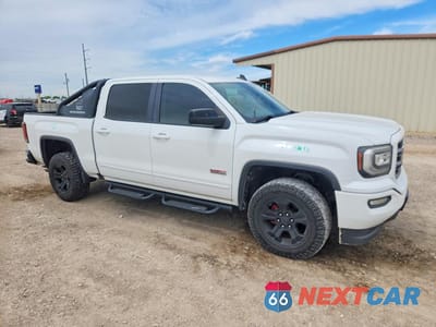Czwarte zdjęcie samochodu z boku: 2016 GMC SIERRA K1500 SLT VIN:3GTU2NEC6GG348516 - miniatura