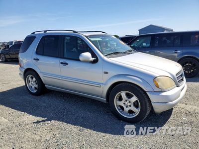 Czwarte zdjęcie samochodu z boku: 2000 MERCEDES-BENZ ML 430 VIN:4JGAB72E8YA194018 - miniatura