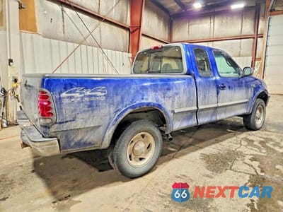 Trzecie zdjęcie samochodu z tyłu: 1997 FORD F150 VIN:2FTDX18W8VCA44355 - miniatura