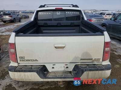 Zdjęcie 6 z 12 samochodu: 2009 HONDA RIDGELINE RTL VIN:2HJYK16549H001842 - miniatura