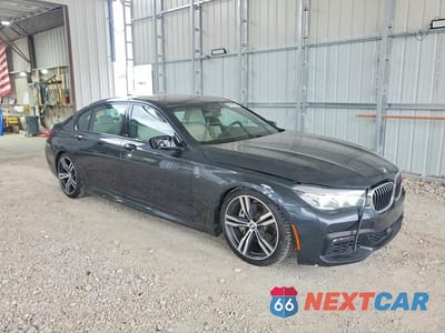 Czwarte zdjęcie samochodu z boku: 2019 BMW 740 I VIN:WBA7E2C58KB217299 - miniatura