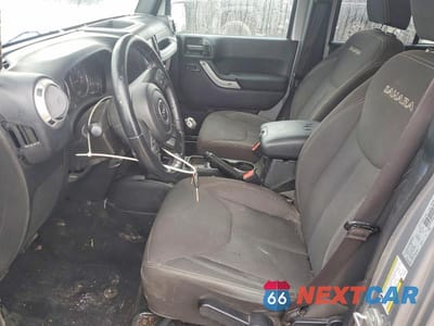Zdjęcie 7 z 12 samochodu: 2017 JEEP WRANGLER UNLIMITED SAHARA VIN:1C4BJWEG0HL540294 - miniatura