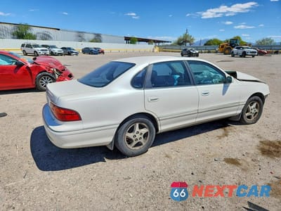 Trzecie zdjęcie samochodu z tyłu: 1999 TOYOTA AVALON XLS VIN:4T1BF18B0XU314488 - miniatura