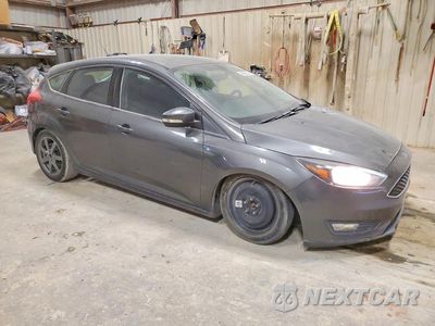 Czwarte zdjęcie samochodu z boku: 2016 FORD FOCUS SE VIN:1FADP3K25GL226370 - miniatura