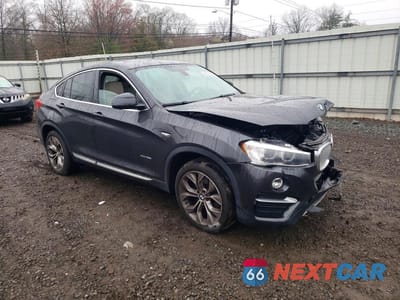Czwarte zdjęcie samochodu z boku: 2015 BMW X4 XDRIVE28I VIN:5UXXW3C57F0M89042 - miniatura