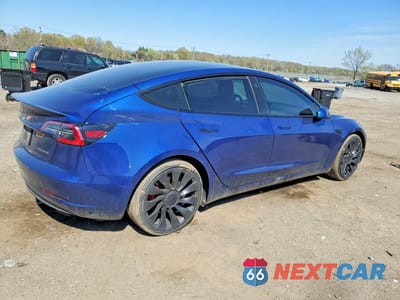 Trzecie zdjęcie samochodu z tyłu: 2022 TESLA MODEL 3 VIN:5YJ3E1ECXNF203090 - miniatura