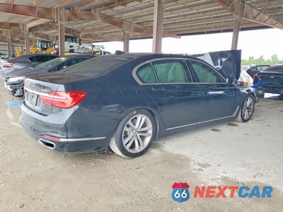 Trzecie zdjęcie samochodu z tyłu: 2019 BMW 750 I VIN:WBA7F0C52KGM24680 - miniatura