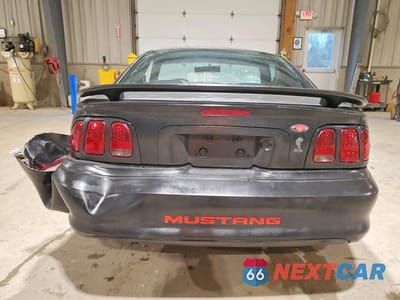 Zdjęcie 6 z 12 samochodu: 1998 FORD MUSTANG VIN:1FAFP4049WF242779 - miniatura