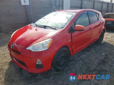 2014 TOYOTA PRIUS C TWO JTDKDTB3XE1559353 - główne zdjęcie licytacji z USA - miniatura
