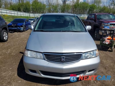 Piąte zdjęcie samochodu w środku: 2001 HONDA ODYSSEY EX VIN:2HKRL18601H549036 - miniatura