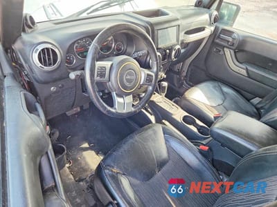 Zdjęcie 8 z 12 samochodu: 2013 JEEP WRANGLER UNLIMITED SPORT VIN:1C4BJWDG4DL628857 - miniatura