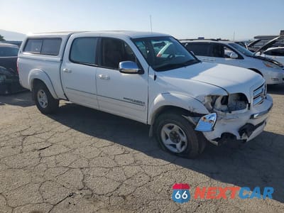 Czwarte zdjęcie samochodu z boku: 2004 TOYOTA TUNDRA DOUBLE CAB SR5 VIN:5TBET34114S450043 - miniatura