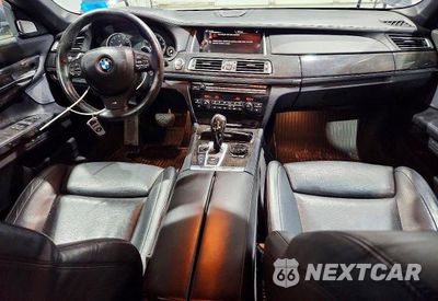 Zdjęcie 8 z 12 samochodu: 2015 BMW 750 LXI VIN:WBAYF8C50FD654860 - miniatura