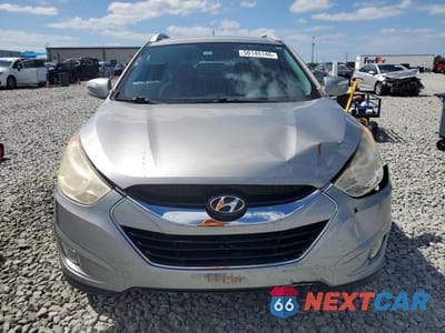 Piąte zdjęcie samochodu w środku: 2010 HYUNDAI TUCSON LIMITED VIN:KM8JU3AC5AU079822 - miniatura
