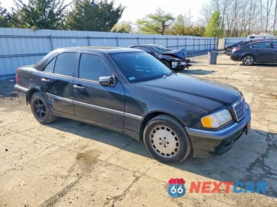 Czwarte zdjęcie samochodu z boku: 2000 MERCEDES-BENZ C 230 VIN:WDBHA24G7YF895612 - miniatura