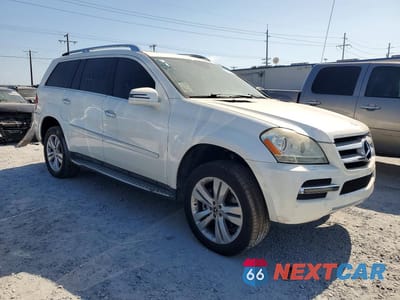 Czwarte zdjęcie samochodu z boku: 2012 MERCEDES-BENZ GL 450 4MATIC VIN:4JGBF7BE2CA791702 - miniatura