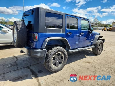 Trzecie zdjęcie samochodu z tyłu: 2009 JEEP WRANGLER UNLIMITED SAHARA VIN:1J8GA59199L715254 - miniatura