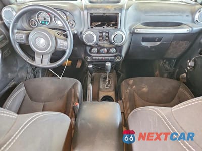 Zdjęcie 8 z 12 samochodu: 2015 JEEP WRANGLER UNLIMITED SAHARA VIN:1C4BJWEG2FL647330 - miniatura