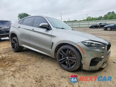Czwarte zdjęcie samochodu z boku: 2019 BMW X6 M VIN:5YMKW8C52KLR38362 - miniatura