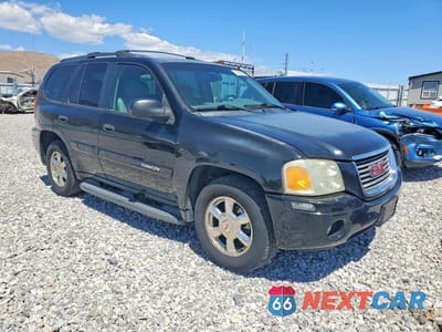 Czwarte zdjęcie samochodu z boku: 2002 GMC ENVOY VIN:1GKDT13S222396133 - miniatura