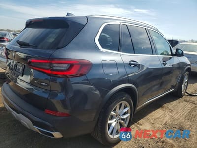 Trzecie zdjęcie samochodu z tyłu: 2021 BMW X5 XDRIVE45E VIN:5UXTA6C09M9H21803 - miniatura