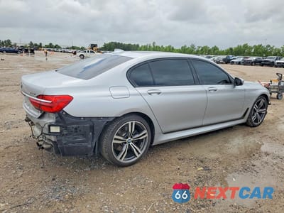 Trzecie zdjęcie samochodu z tyłu: 2017 BMW 750 I VIN:WBA7F0C33HGM21603 - miniatura