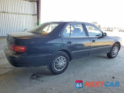 Trzecie zdjęcie samochodu z tyłu: 1996 TOYOTA CAMRY DX VIN:JT2BG12K5T0393869 - miniatura