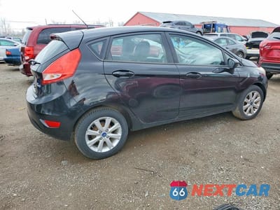 Trzecie zdjęcie samochodu z tyłu: 2012 FORD FIESTA SE VIN:3FADP4EJ5CM151848 - miniatura