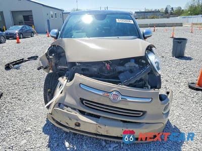 Piąte zdjęcie samochodu w środku: 2015 FIAT 500L LOUNGE VIN:ZFBCFACH7FZ033331 - miniatura
