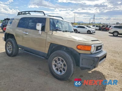 Czwarte zdjęcie samochodu z boku: 2011 TOYOTA FJ CRUISER BASE VIN:JTEBU4BF0BK104156 - miniatura