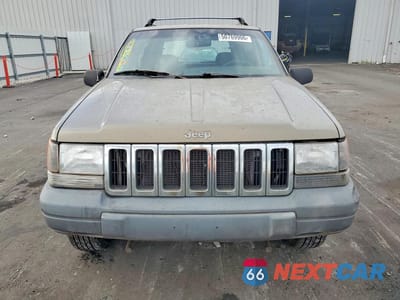 Piąte zdjęcie samochodu w środku: 1997 JEEP GRAND CHEROKEE LAREDO VIN:1J4GZ58S7VC564865 - miniatura