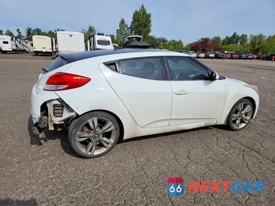 Trzecie zdjęcie samochodu z tyłu: 2013 HYUNDAI VELOSTER BASE VIN:KMHTC6AD7DU085356 - miniatura