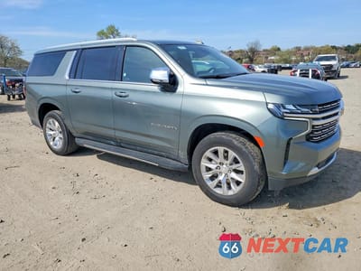 Czwarte zdjęcie samochodu z boku: 2023 CHEVROLET SUBURBAN C1500 PREMIER VIN:1GNSCFKD5PR478236 - miniatura