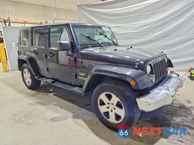 Czwarte zdjęcie samochodu z boku: 2010 JEEP WRANGLER UNLIMITED SAHARA VIN:1J4BA5H17AL116967 - miniatura