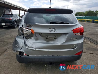 Zdjęcie 6 z 13 samochodu: 2013 HYUNDAI TUCSON LIMITED VIN:KM8JUCAC6DU690592 - miniatura