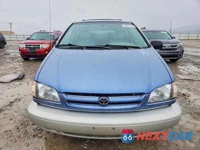 Piąte zdjęcie samochodu w środku: 1999 TOYOTA SIENNA XLE VIN:4T3ZF13C6XU163890 - miniatura