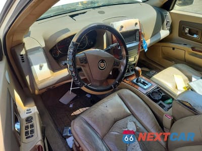 Zdjęcie 8 z 13 samochodu: 2006 CADILLAC SRX VIN:1GYEE637060137137 - miniatura