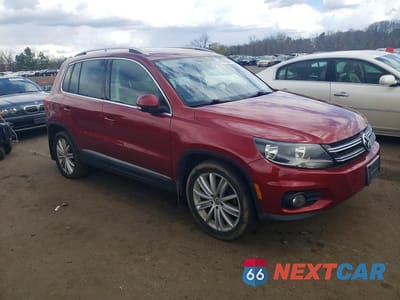 Czwarte zdjęcie samochodu z boku: 2013 VOLKSWAGEN TIGUAN S VIN:WVGAV3AX1DW098375 - miniatura